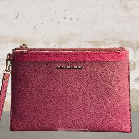 Michael Kors Handbags - Michael Kors Jet Set Travel XL Pop Out Clutch in Pomegranate